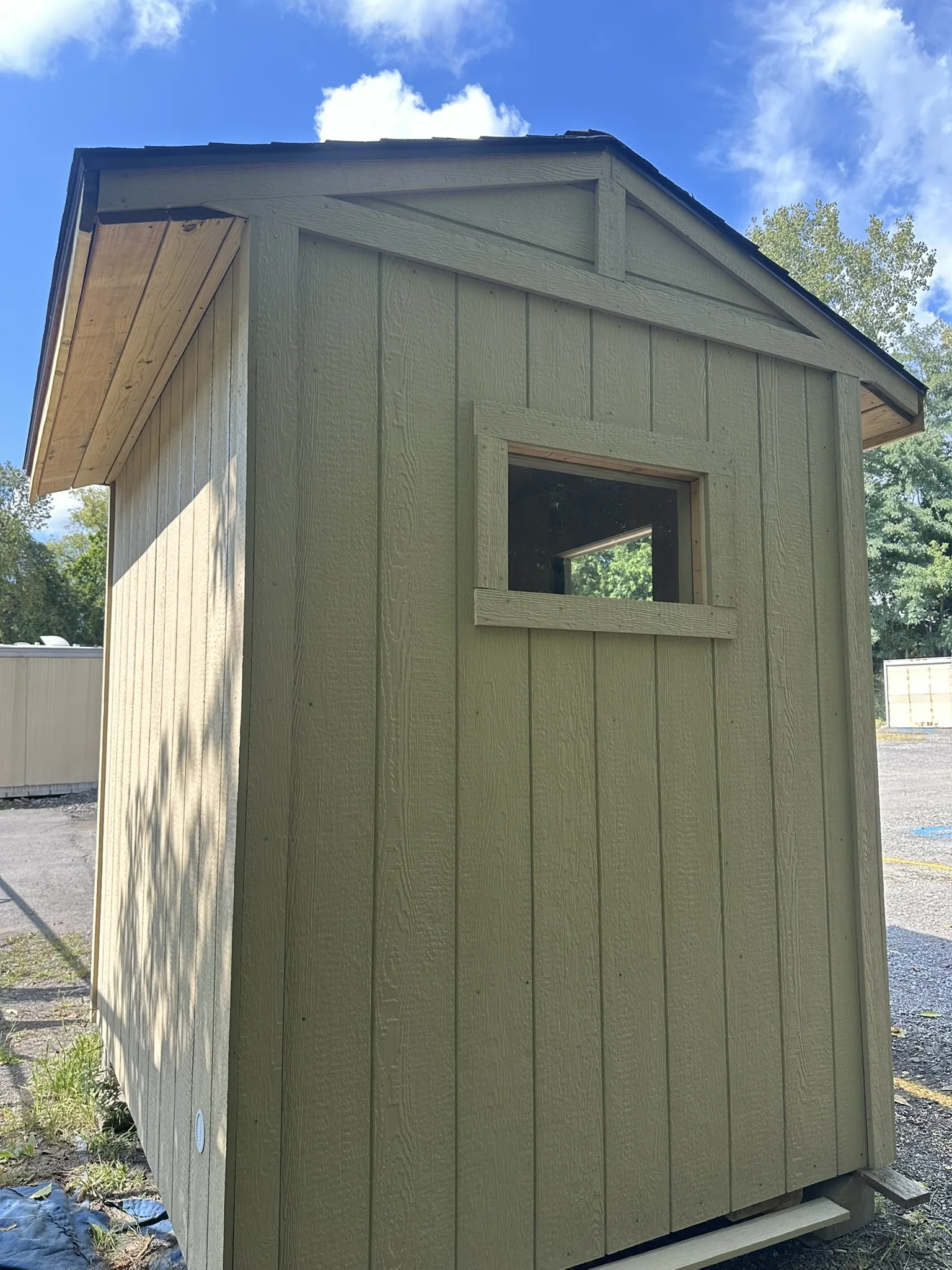 Custom-built shed rear exterior and window